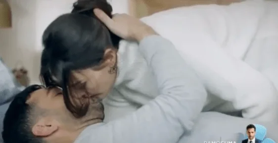 Popular star Esra Bilgic in hot water after kissing video goes viral!
